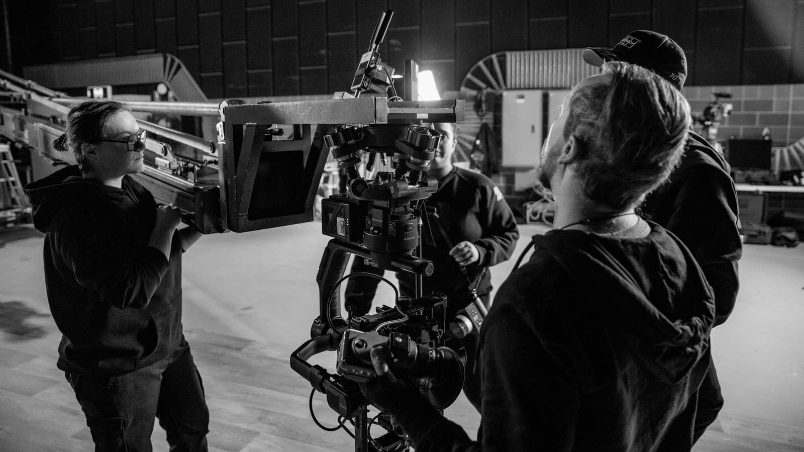 The JLM Studios crew on a jib, behind the scenes