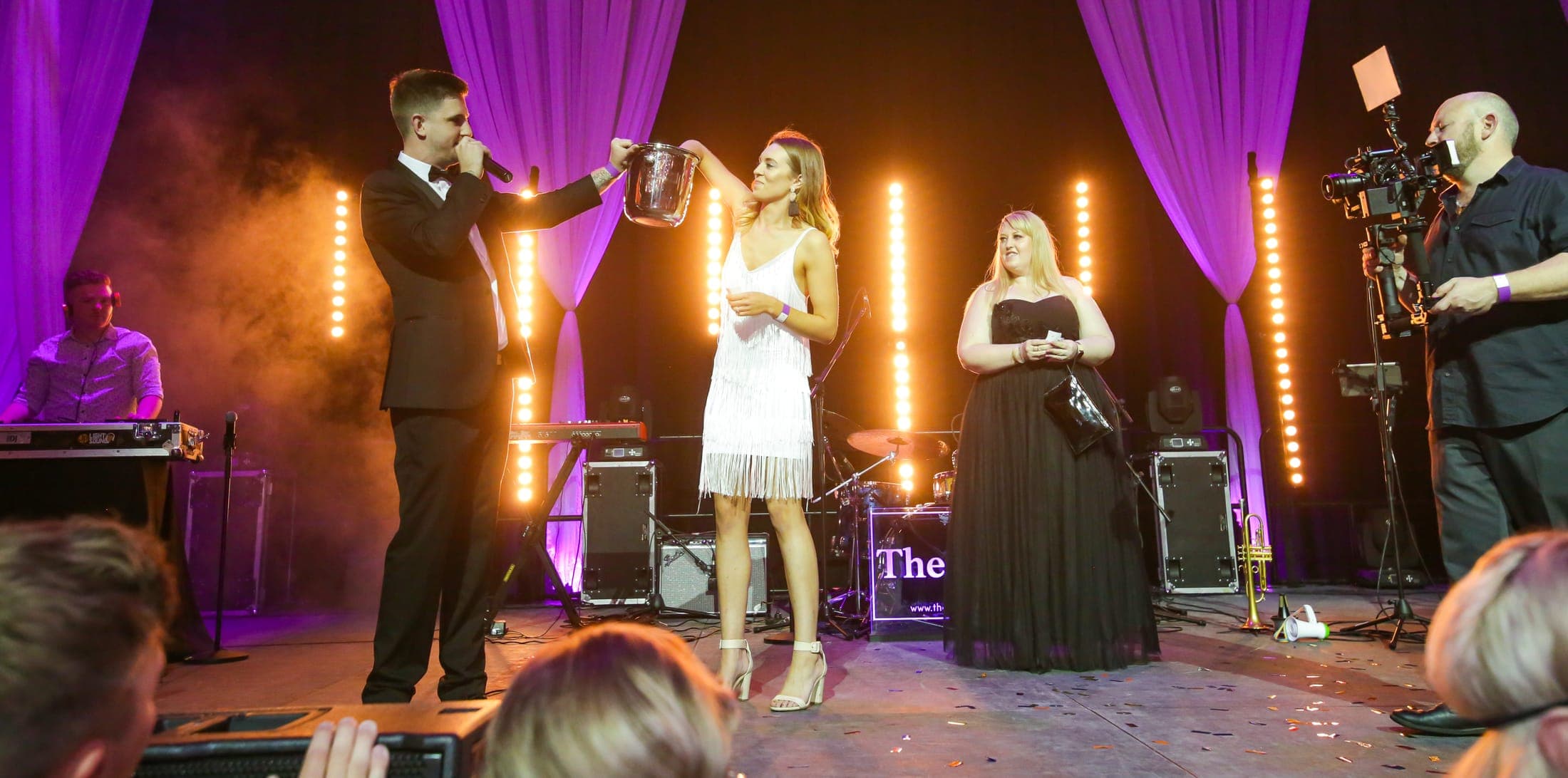 Live band performing on stage under gala lighting, Adelaide event photography